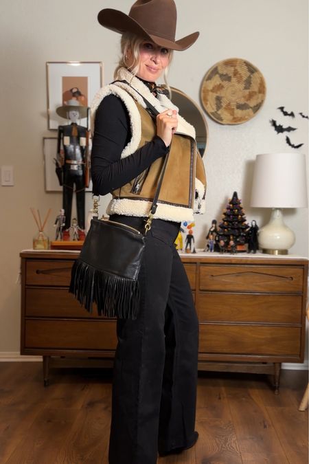 Coastal cowgirl has gone full fall. This faux suede vest is present for those cooler days. It’s from Zara but I’ve linked other similar items.

Fringe leather bag from Rais Case. Tagged in my Instagram. 

#LTKstyletip #LTKfindsunder50 #LTKover40