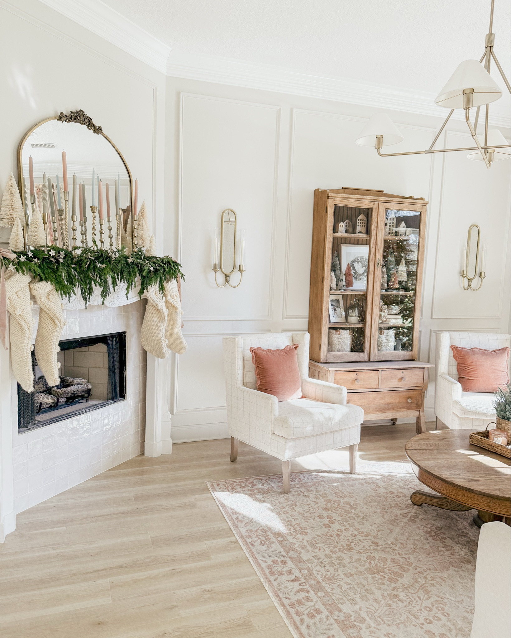 My favorite view 🥰🥹 

Living room Christmas decor mantle rug pillow sconce chair tree 

#LTKSeasonal #LTKHoliday #LTKHome