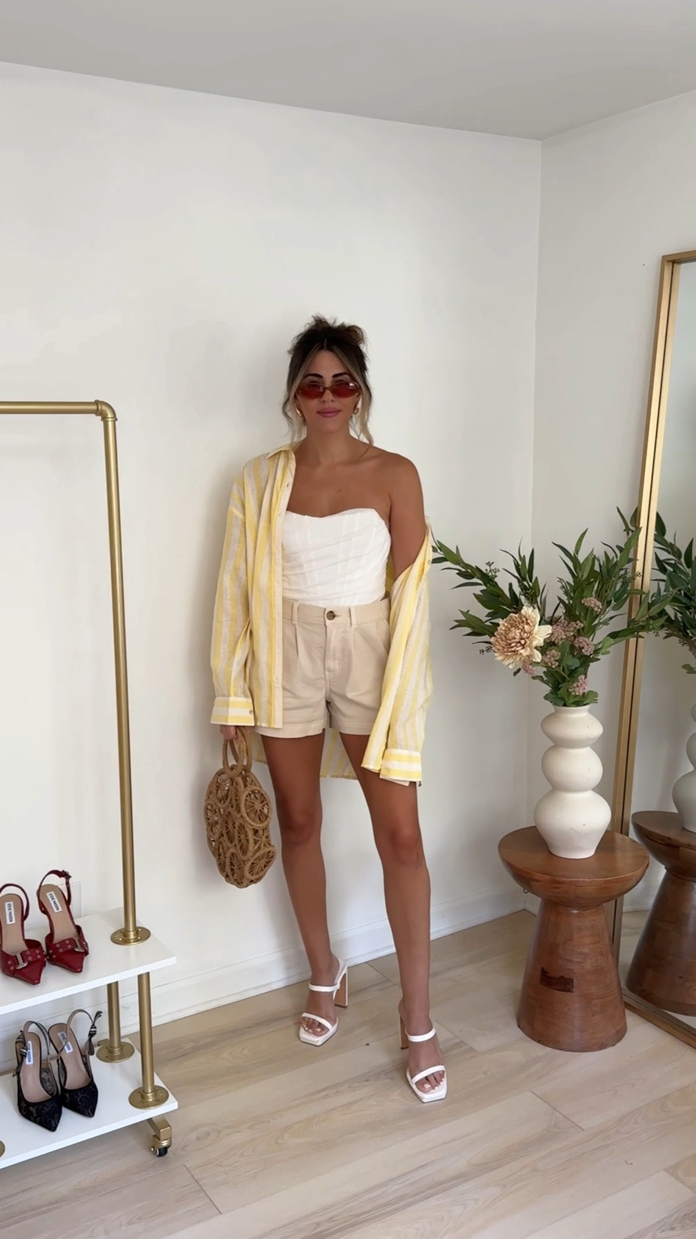 summer outfit ideas: white corset (size 2) khaki trouser shorts ( size 4) and a yellow stripe button up (sized up to a large for an oversized fit)

#LTKSummerSales #LTKFindsUnder50 #LTKVideo