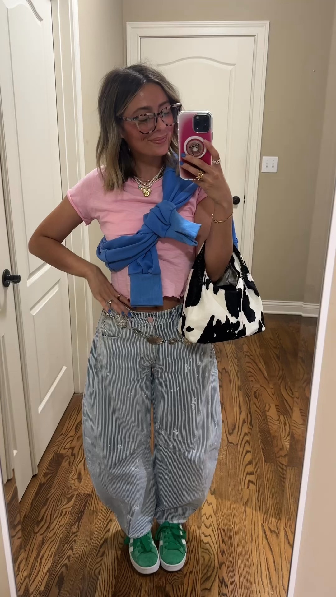 Small in the tee, large in the sweatshirt and 24 in  the jeans 