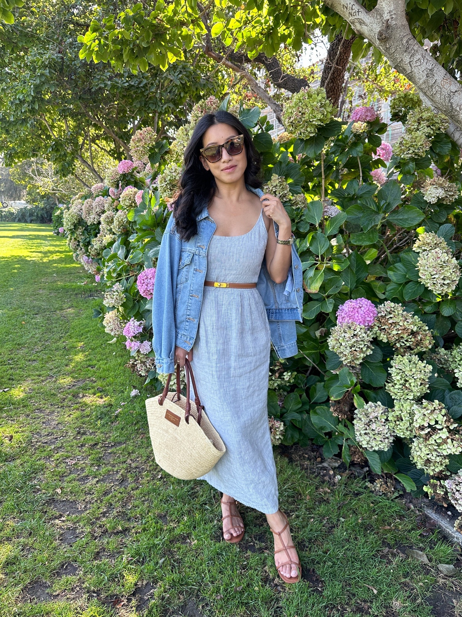 • Quince linen midi dress in blue pinstripe xs - elegant 100% linen dress that is a longer midi/maxi length on me and is petite friendly in proportions Straps are adjustable with slightly smocked back, and cotton lining. I use Nippies or go no bra on this one because it’s double layered!

• Levi’s 90s trucker jacket xxs - a relaxed oversized fit. They don’t make xxs anymore so I also linked several similar options - BRF comes in petite sizing and Aritzia comes in xxs which I tried on and it fits very similar to my Levi’s one 

•Sezane basket tote

•$15 sunglasses

•Hermes belt, look for less linked

•old J.Crew sandals, similar style linked 

#LTKSeasonal #LTKStyleTip #LTKPetite