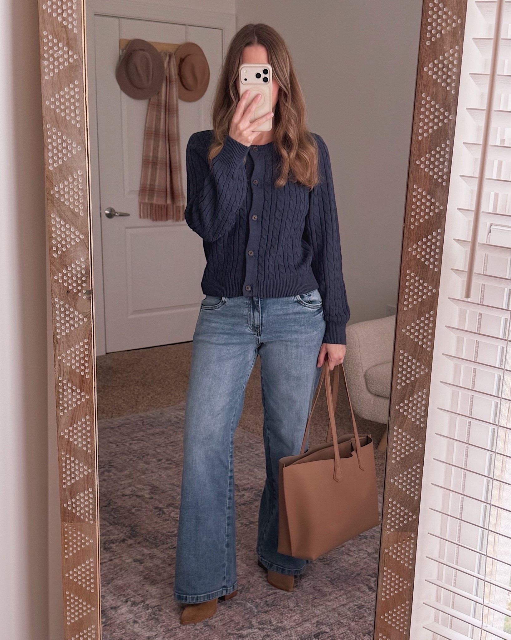 This cable knit cardigan from the Nordstrom Anniversary NSale is giving all the cozy fall vibes I needed, and wide leg jeans have never looked more polished paired with a tan tote.

#LTKSaleAlert #LTKOver40 #LTKmomlife