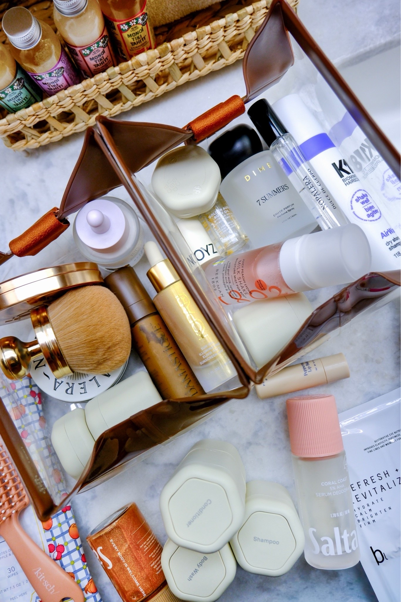 Travel Toiletry Bag Summer Beauty Favorites ✨

The clear travel case everyone keeps asking about. These summer scents all layer beautifully together, and the two cosmetic cases are magnetic so they pop open on your counter exactly like this.

Everything from travel size body oil and self tanner to dry shampoo, shampoo bars, serum deodorant, and my favorite summer perfume, all packed and ready to go.

Clear toiletry bag | travel beauty essentials | summer fragrance layering | travel size skincare | vacation makeup bag | magnetic cosmetic case | packing favorites

#LTKTravel #LTKSeasonal #LTKmorningroutine