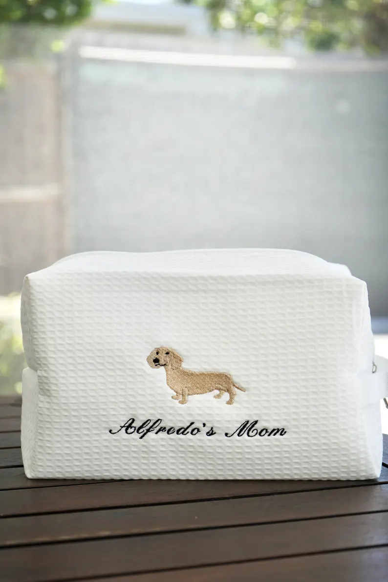 For the Dachshund lovers who carry their love for their pup everywhere — this embroidered pouch... | Etsy (US)