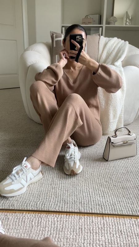 Cozy loungewear outfit. It is a rainy day Today in San Diego. Craving comfy clothes and a nice oair of new balance sneakers 👟. Rainy day is a goid excuse to wear a bag made of polyurethane and this one that is so similar to the mini kelly bag is perfect 

#LTKfindsunder100 #LTKfindsunder50 #LTKstyletip