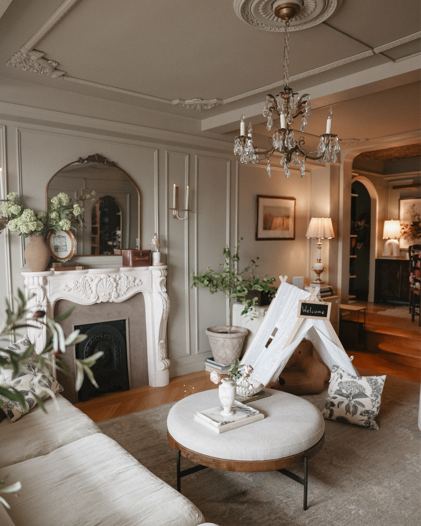 The evolution of this living room that has also morphed into a playroom. Embracing it’s every phase! @wayfair is celebrating their anniversary with a big Anniversary Sale this week (up to 70% off home items!) and this play tent is included! Sharing more details in my story of my favorites of the sale! #wayfair #ad 

#LTKsalealert