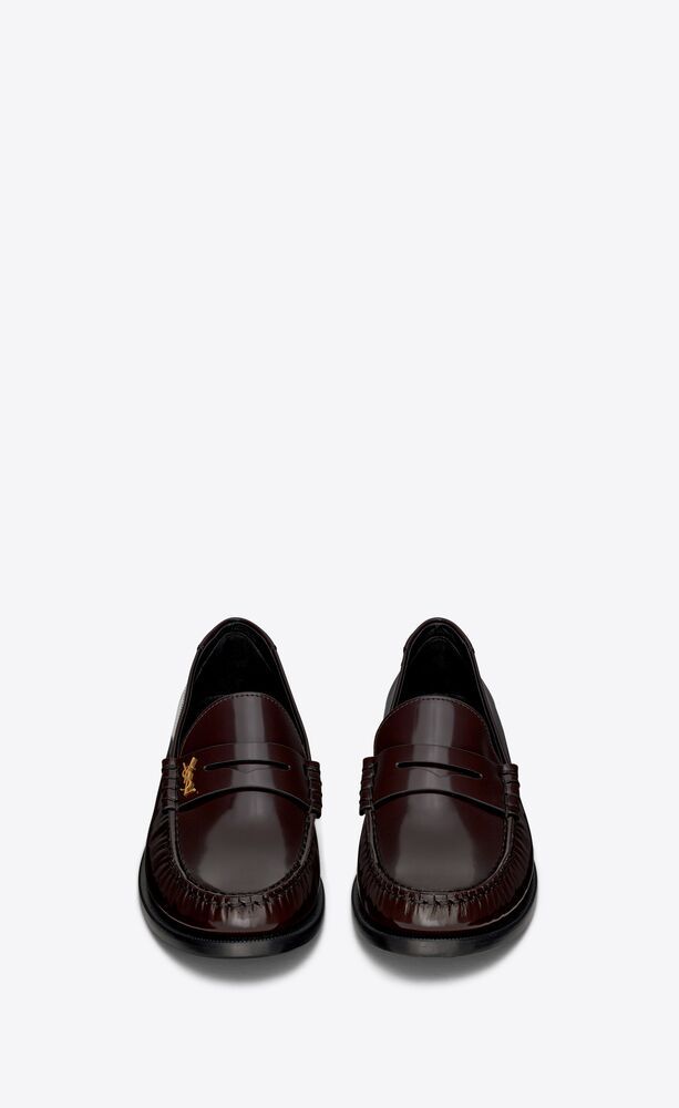 Penny loafers with Saint Laurent embossed back tab and saddle decorated with metal YSL initials o... | Saint Laurent Inc. (Global)