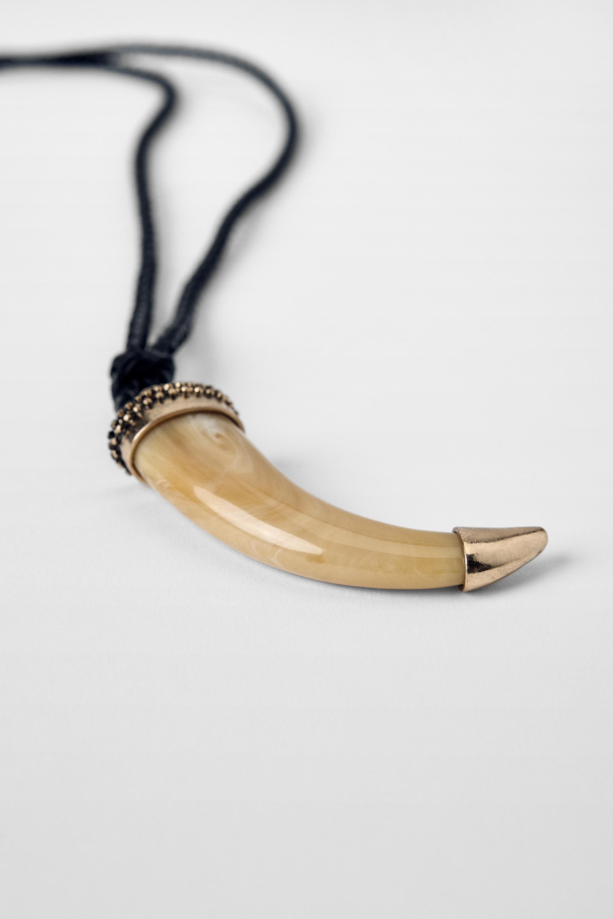 Braided rope and knot necklace. Horn pendant in  coloured resin. Tie closure.Special collaboratio... | Zara UK