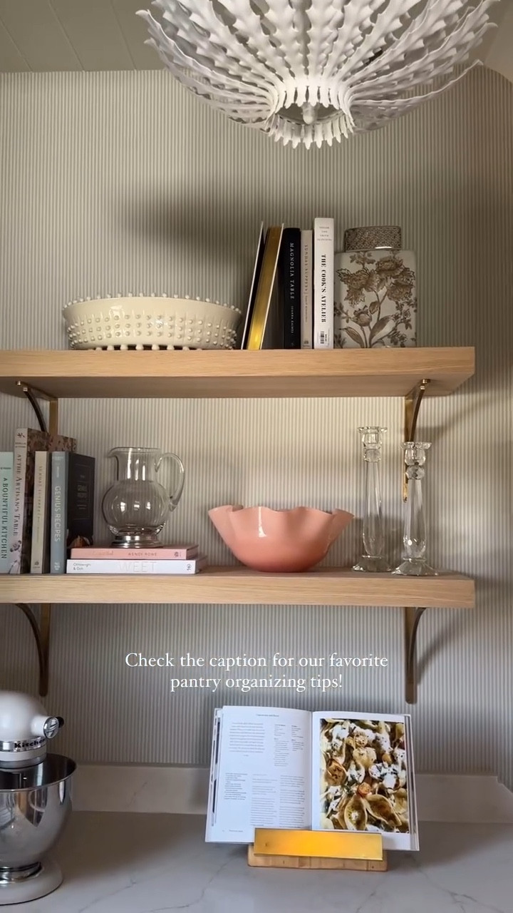 Where beauty meets function is our happy place!
Below are some some of our favorite ways to organize a pantry while keeping is looking sleek. 

1. Use functional items as both décor and styling elements. This way, they’re not only accessible but also blend form and function seamlessly!

2. Group Like Items Together: Keep similar items in one place—grains with grains, snacks with snacks, and so on. This makes it easier to find things quickly.

3. Use Clear Containers: Transfer bulk items like rice, pasta, and snacks into clear, airtight containers. Not only does it keep food fresh, but it also makes everything visible and easy to locate.
 
3. Incorporate Baskets: Use baskets to corral loose items like chip bags, snacks, or onions and potatoes. They’re perfect for grouping things that don’t sit well on shelves.

4. Add Lazy Susans: Use rotating trays (Lazy Susans) for hard-to-reach corners or deep shelves. They make it easy to see and grab items, especially condiments or jars.

These tips will help you create a pantry that’s not only organized but also practical and easy to maintain!

#pantry #hone #organization #butler #bowl #shelves #style

#LTKHome #LTKFamily #LTKSeasonal