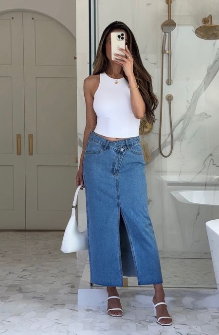Lovely love!!!! You got it!!! 🤗 I’m loving the chic yet laidback style of this jean skirt!!! It looks like it’s from Reformation!! 🤍 The asymmetrical waist is a fun twist!!  Wearing size Small in skirt, size XS in white tank (linking alternatives too 😍) and size 8 in shoes!!! Hope your day is happy gf!!! You make me so happy!!! 😍💕 Xoxo!!!!

#LTKstyletip #LTKunder100 #LTKunder50
