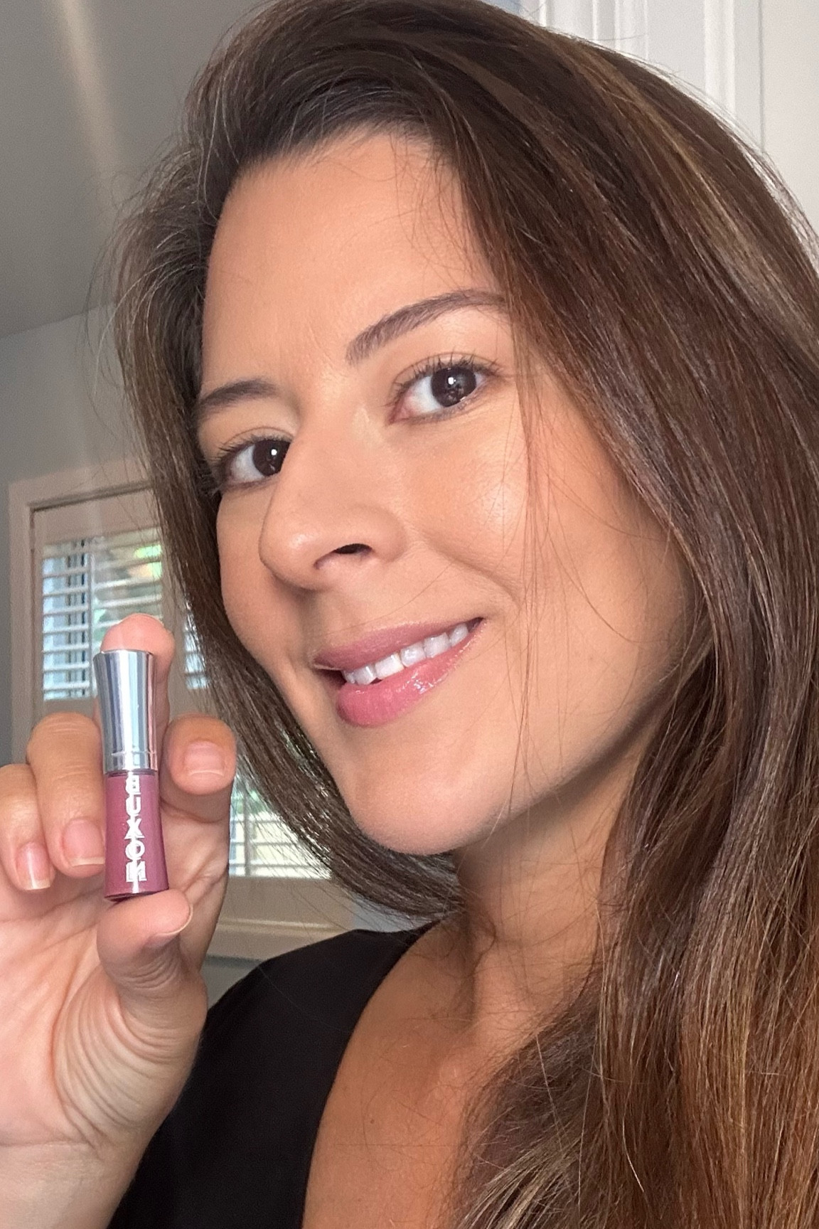 A tiny lip plump doesn’t hurt, that’s why I use the Buxom lip polish gloss in Brandi. I love mini makeup products because they travel so well. A little sample just makes me want to buy the full product. 

#LTKbeauty #LTKsalealert #LTKtravel