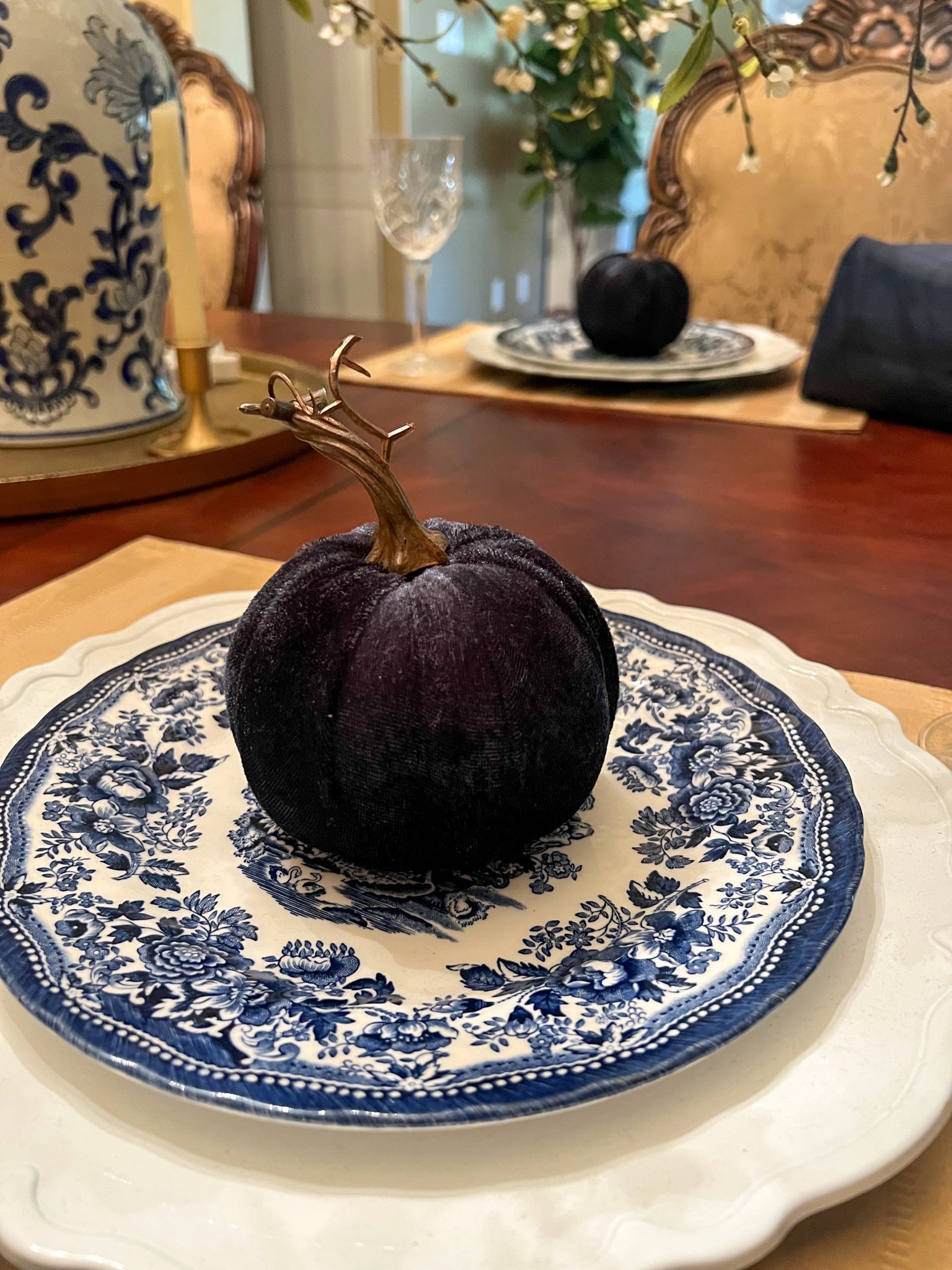 Fall dining room tablescape
Navy blue velvet pumpkin
Chinoiserie dinner plates
Blue and white
Table setting
Crystal wine glasses
Grand millennial 

#LTKFindsUnder50 #LTKHome #LTKSeasonal