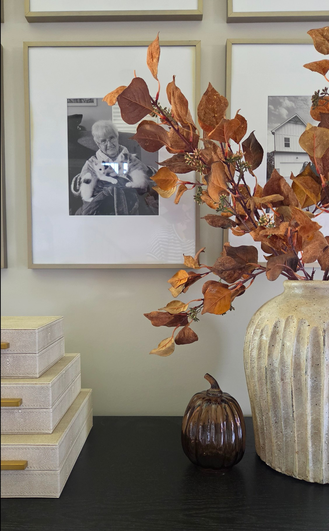 Textured ceramic, warm amber glass, and rich fall stems create the perfect layered autumn vignette. Simple touches that bring cozy, elevated warmth to any console table.#FallDecor #EntrywayDecor #ConsoleTableStyling #HomeInspo

#LTKSeasonal #LTKHome