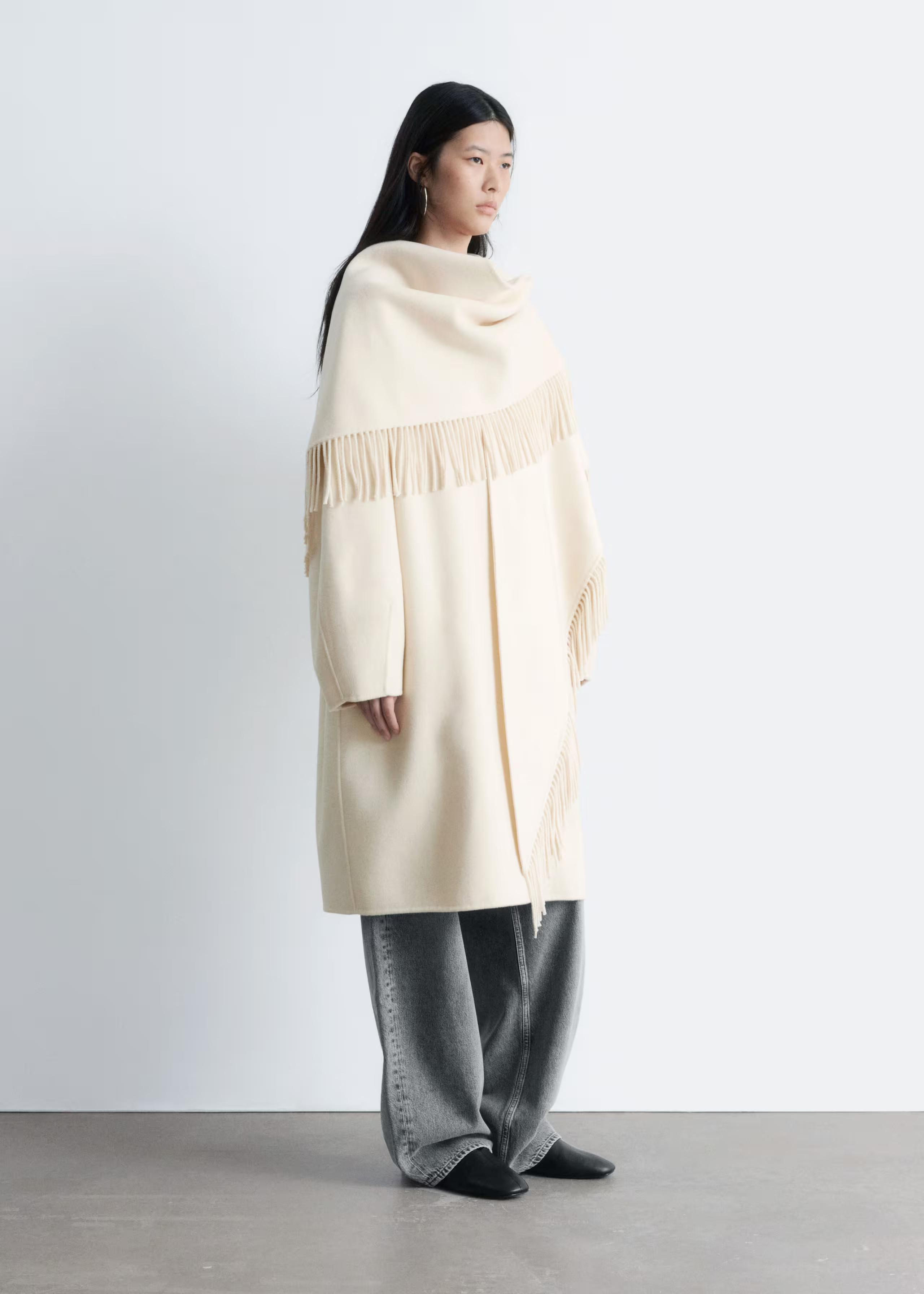 Clothing/Jackets & Coats/Coats/Fringed Shawl Wool Coat$ 499Coming soonCreamNotify mechevron-downf... | & Other Stories - US