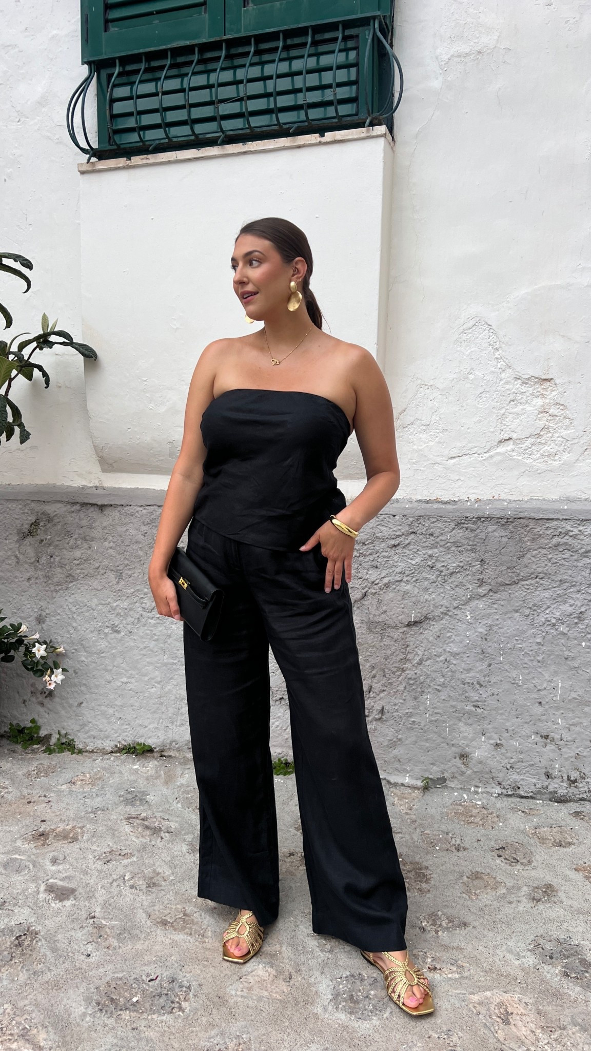 Effortless black-on-black always wins. This strapless top paired with flowy wide leg pants is such a chic option for dinners, travel nights, or exploring on vacation. Simple, flattering, and easy to dress up with gold accessories.

Keywords:
black outfit, strapless top outfit, wide leg pants, vacation dinner outfit, black pants outfit, travel outfit, chic vacation look, summer night outfit, minimalist outfit, elevated basics, resort wear, black monochrome 

#LTKValentine #LTKgrwm #LTKootd