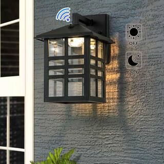 1-Light Black Dusk to Dawn LED Outdoor Wall Lantern Sconce with Clear Glass Shade | The Home Depot