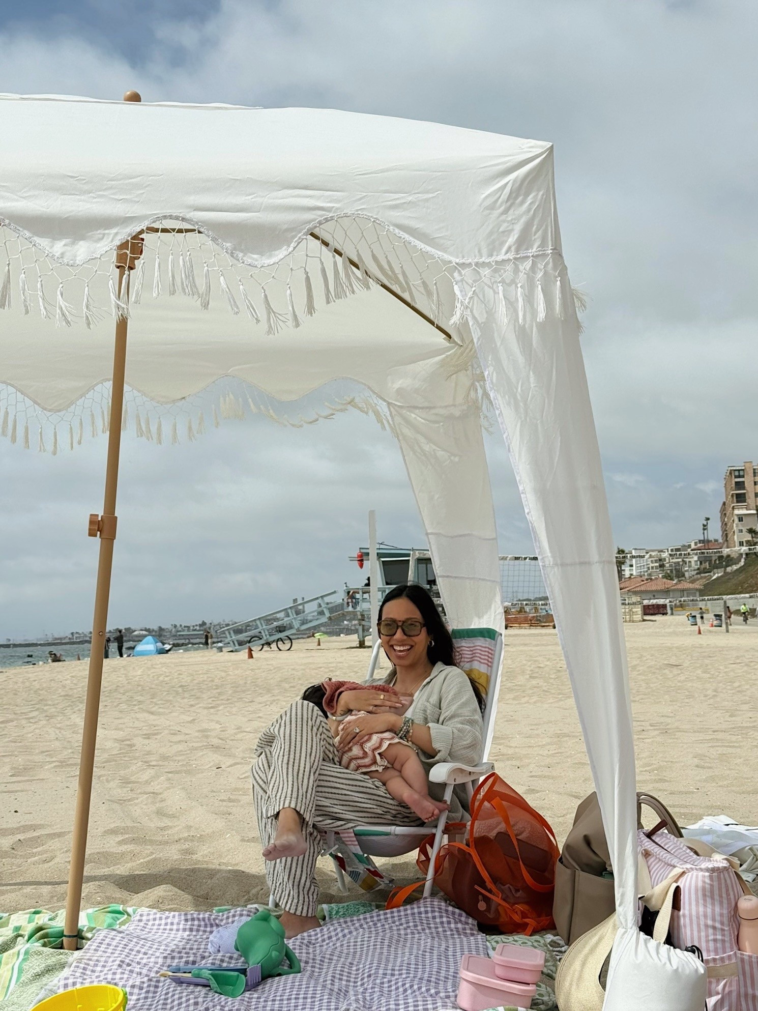 so many compliments on my friend’s beach canopy and I get it, because it’s so cute! might need to snag one for myself. super easy to assemble (and disassemble) making it perfect for beach days this summer ☀️

#LTKSummerEdit #LTKBaby #LTKSeasonal