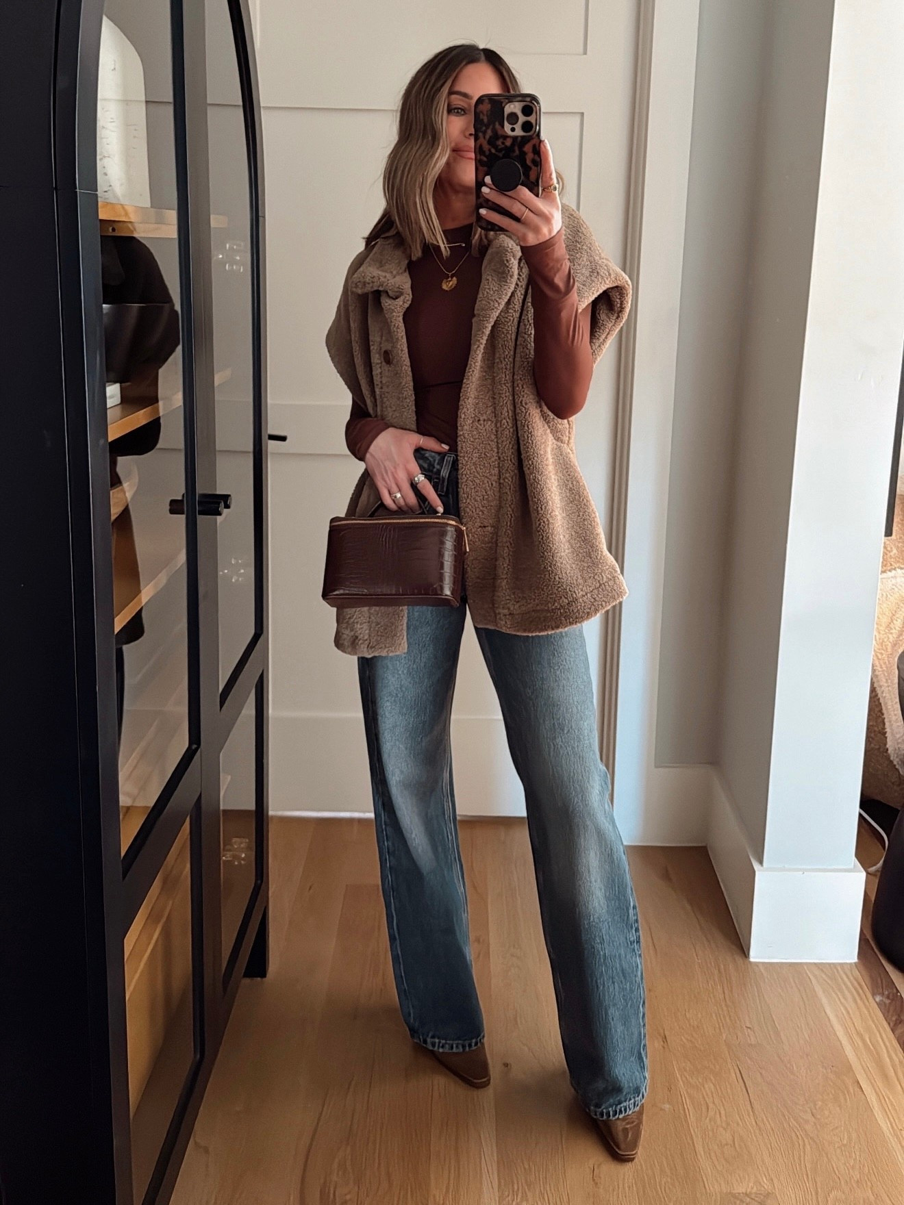 My vest looks and feels SO luxe, and it’s from Amazon! 🤩😍 my bag is $20 and I’ve worn it so many times already! Vest is oversized, I’m in a small. Top and jeans are true to size! 

#LTKgrwm #LTKootd #LTKFindsUnder50