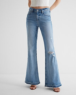 Mid Rise Medium Wash Ripped Raw Hem 70s Flare Jeans | Express