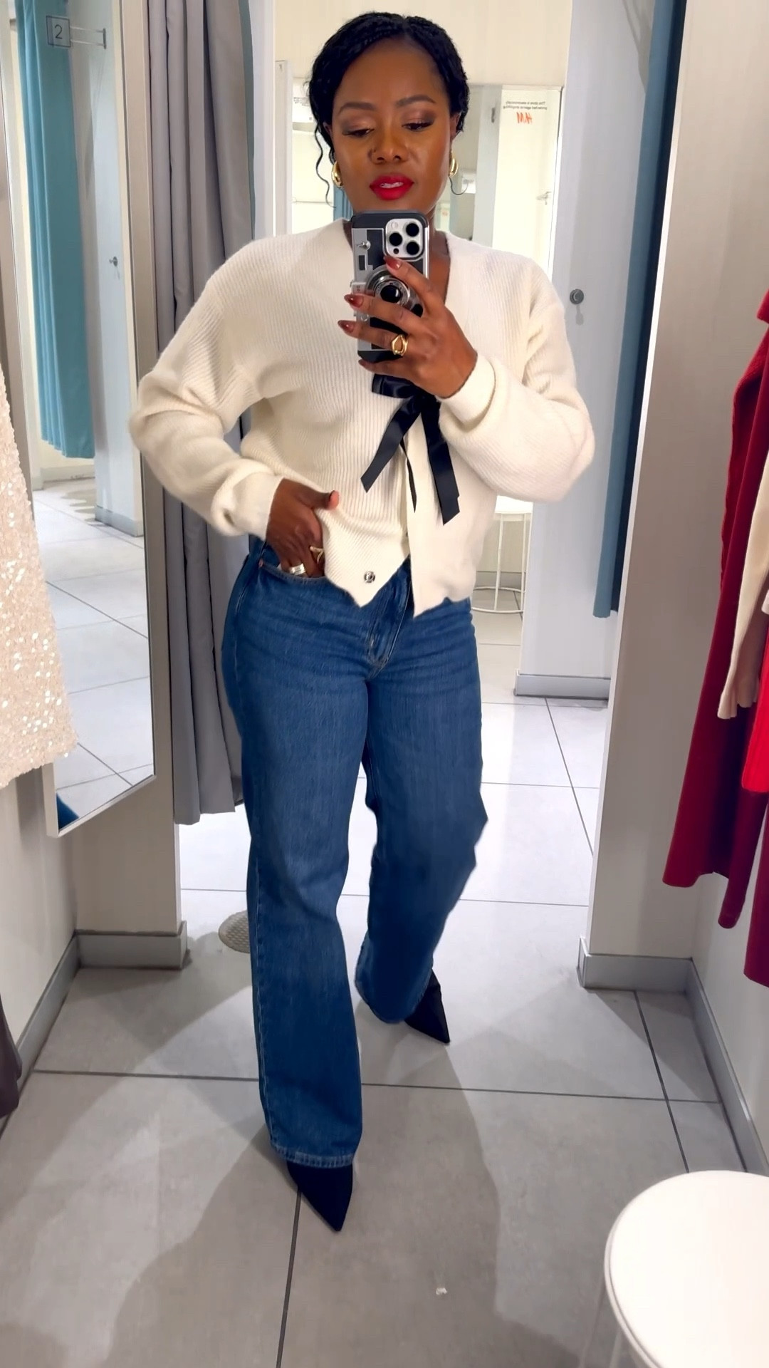 Casual chic holiday style. Shop the look. #jeans #holidayoutfit #bowsweater #bow #jeans 

#LTKSeasonal #LTKHoliday #LTKFindsUnder100