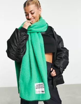ASOS Weekend Collective fluffy scarf with blanket stitch and label in green | ASOS (Global)