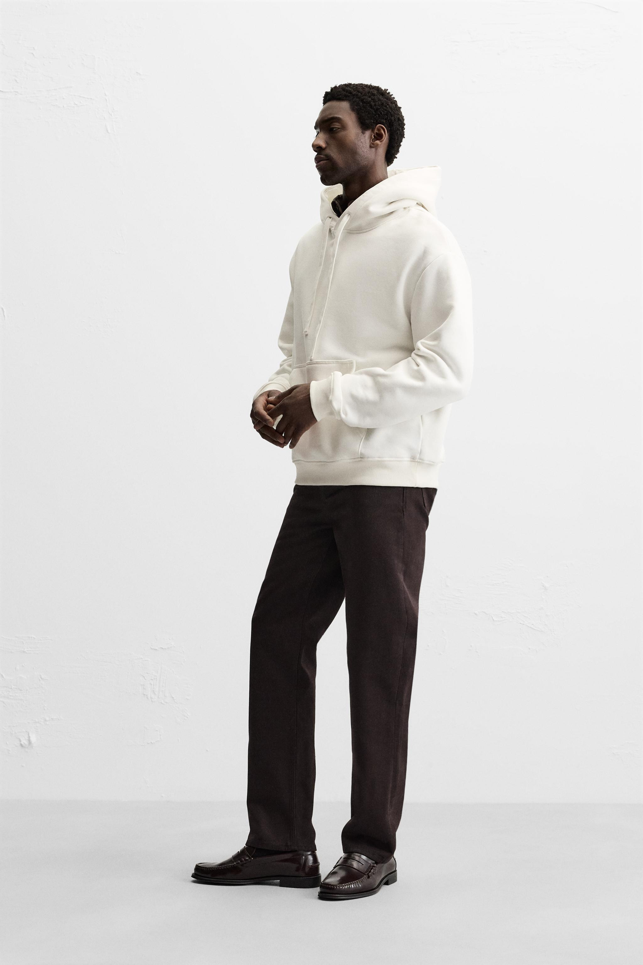 Fleece-lined cotton hoodie. Adjustable hood and long sleeves. Front kangaroo pocket. Ribbed trim. | Zara US