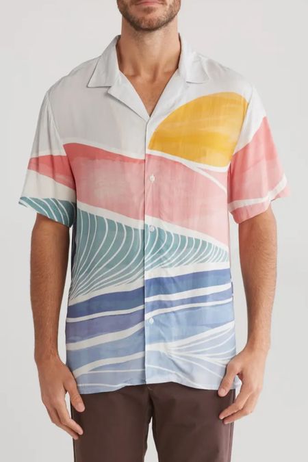 Original Paperbacks
Print Short Sleeve Button-Up Shirt

A sunny art print puts a throwback spin on a stylish shirt that's sure to turn heads

#LTKStyleTip #LTKParties #LTKMens