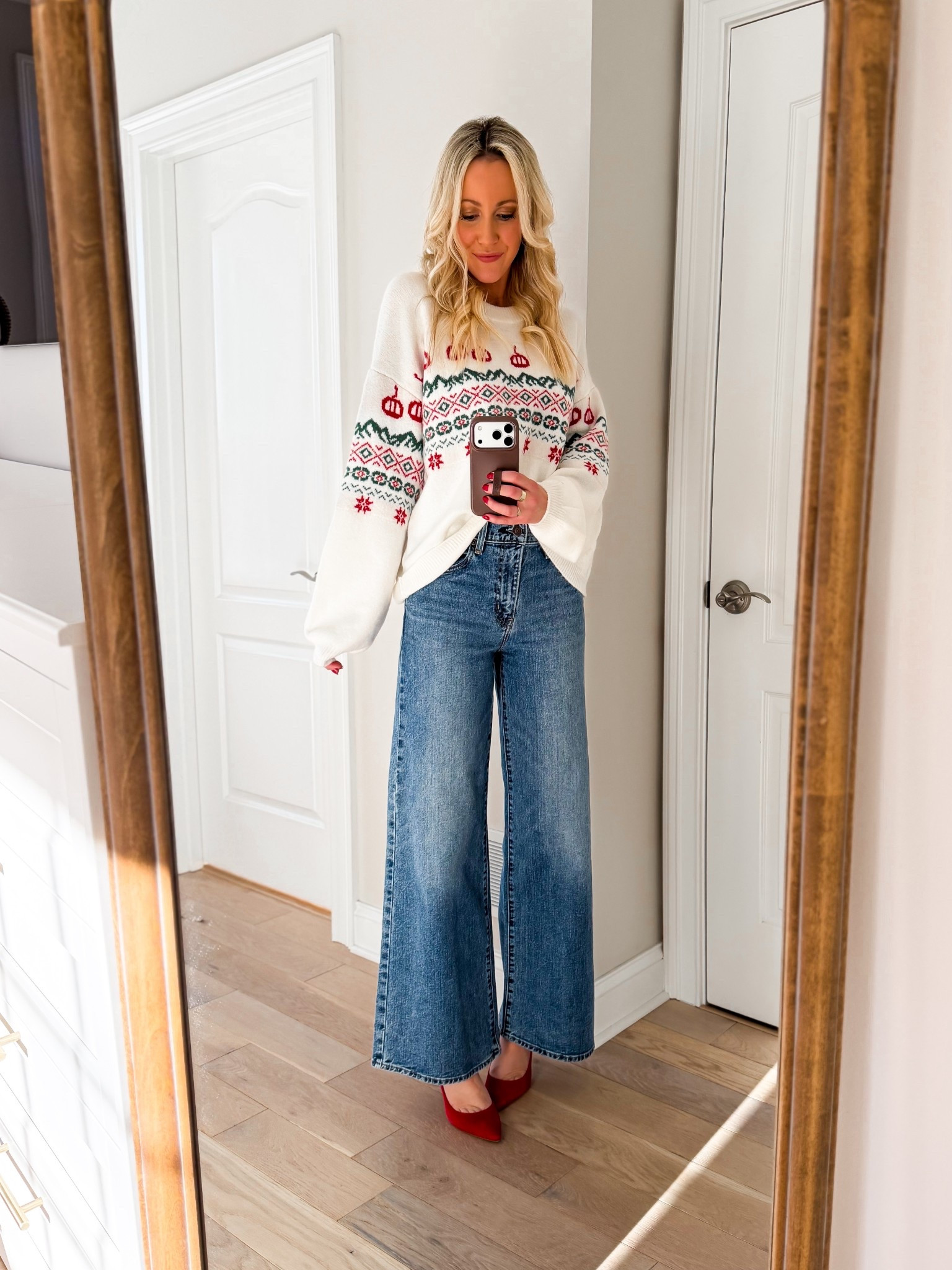 Holiday to winter new arrival from Target!🎄❄️ Target new arrival that is cozy, cozy, cozy! 🤩 How cute is this fair isle holiday sweater?The best part is that you can take it into winter, too! SOO soft and stretchy! Btw, these high rise wide leg jeans are my favorite jeans EVER. No joke. These outfits would be perfect for Christmas, holiday parties, even teachers! Even perfect to wear after the holidays! I’m wearing medium in the sweater and 25 regular in the denim! I’m 5’7”. 

#LTKFindsUnder50 #LTKGiftGuide #LTKHoliday