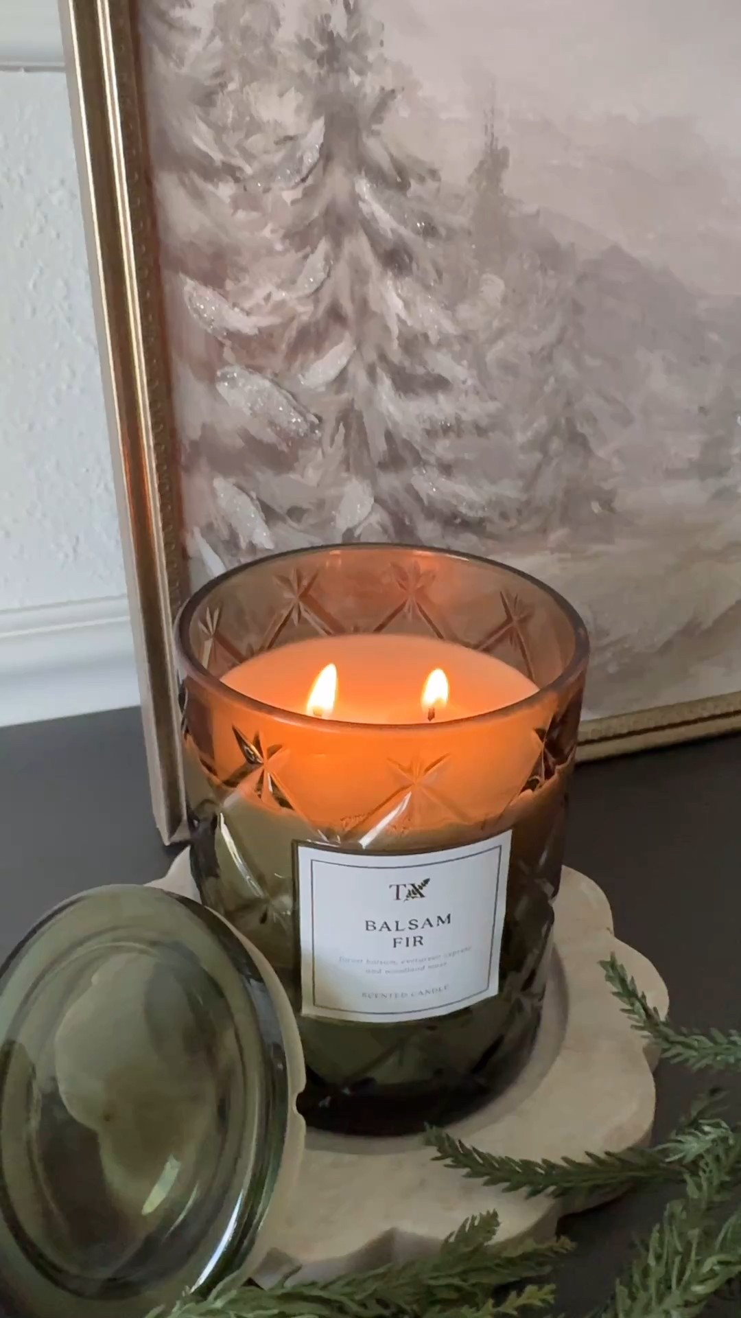 This holiday candle smells amazing! 🎄✨ The scent mix of fresh balsam, frosted citrus, and white musk makes your whole home smell like the holidays.

I love the diamond glass jar — so pretty to display — and it has two wicks for an even burn. It lasts up to 42 hours, so it’ll carry you through the whole season. Made with a high-quality wax blend for a clean, strong scent.

Perfect for gifting or cozy nights in! 💚

#holidaycandle #christmasdecor #cozyhome #ltkhome #candles

#LTKSeasonal #LTKHoliday #LTKHome