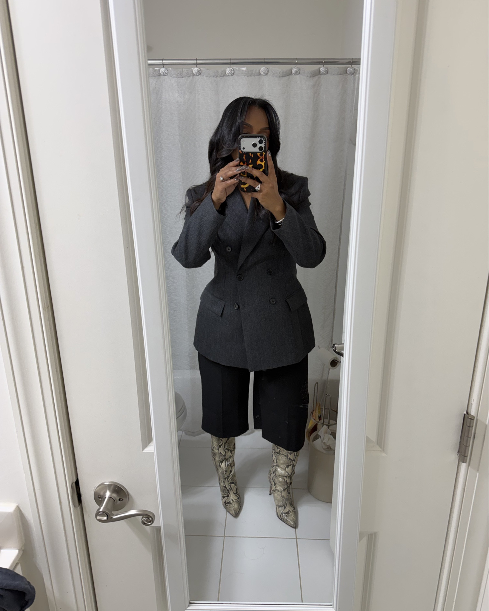 A winter outfit that will never go out of style. Styling Bermuda shorts and boots . Blazer is from source unknown . 

#LTKSeasonal #LTKFindsUnder100 #LTKMidsize