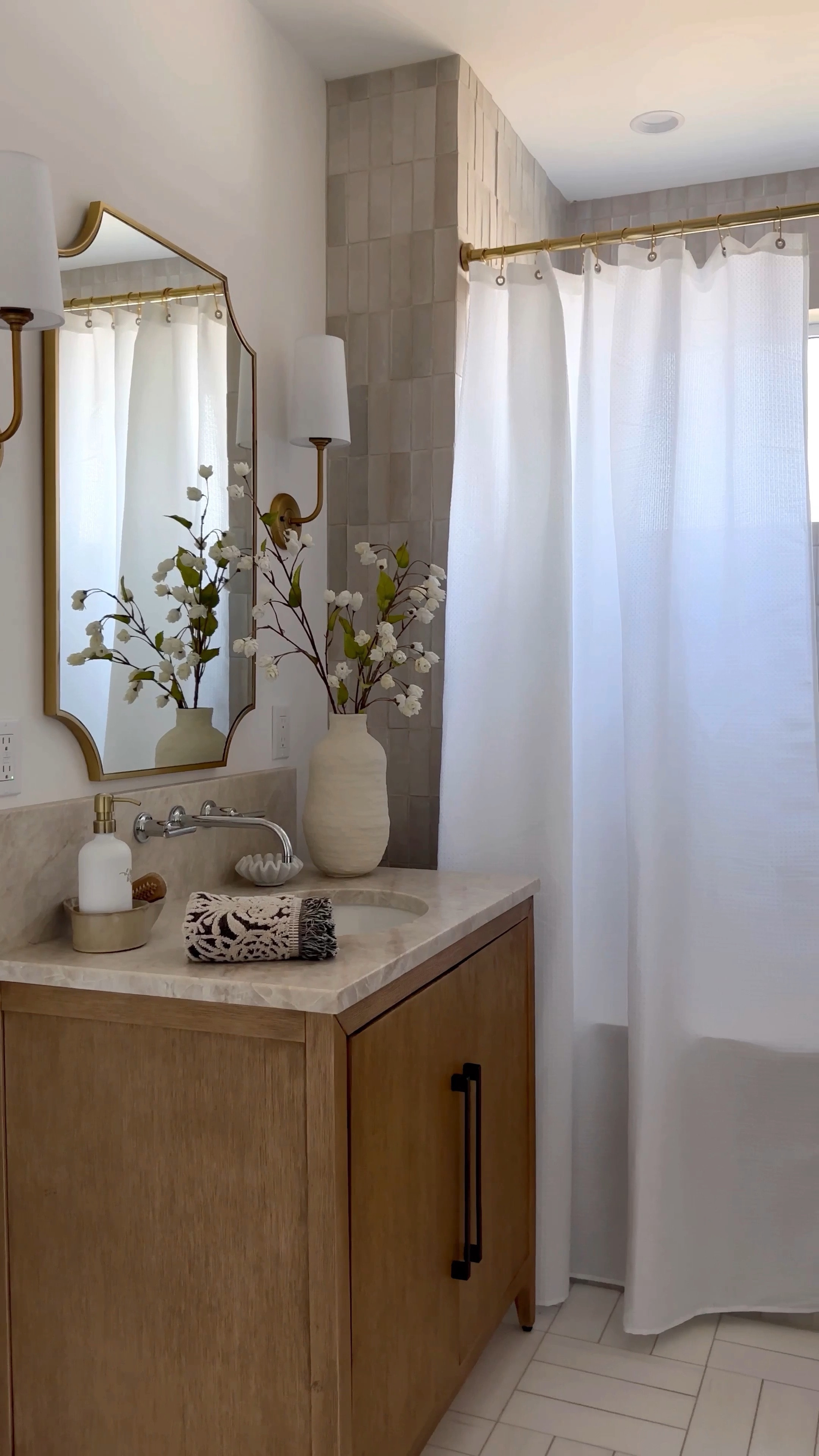 2 Simple Upgrades to give your bathroom a high end look. 

Shower curtain. Shower rod. Vases. Florals  

#LTKhome #LTKunder100 #LTKstyletip