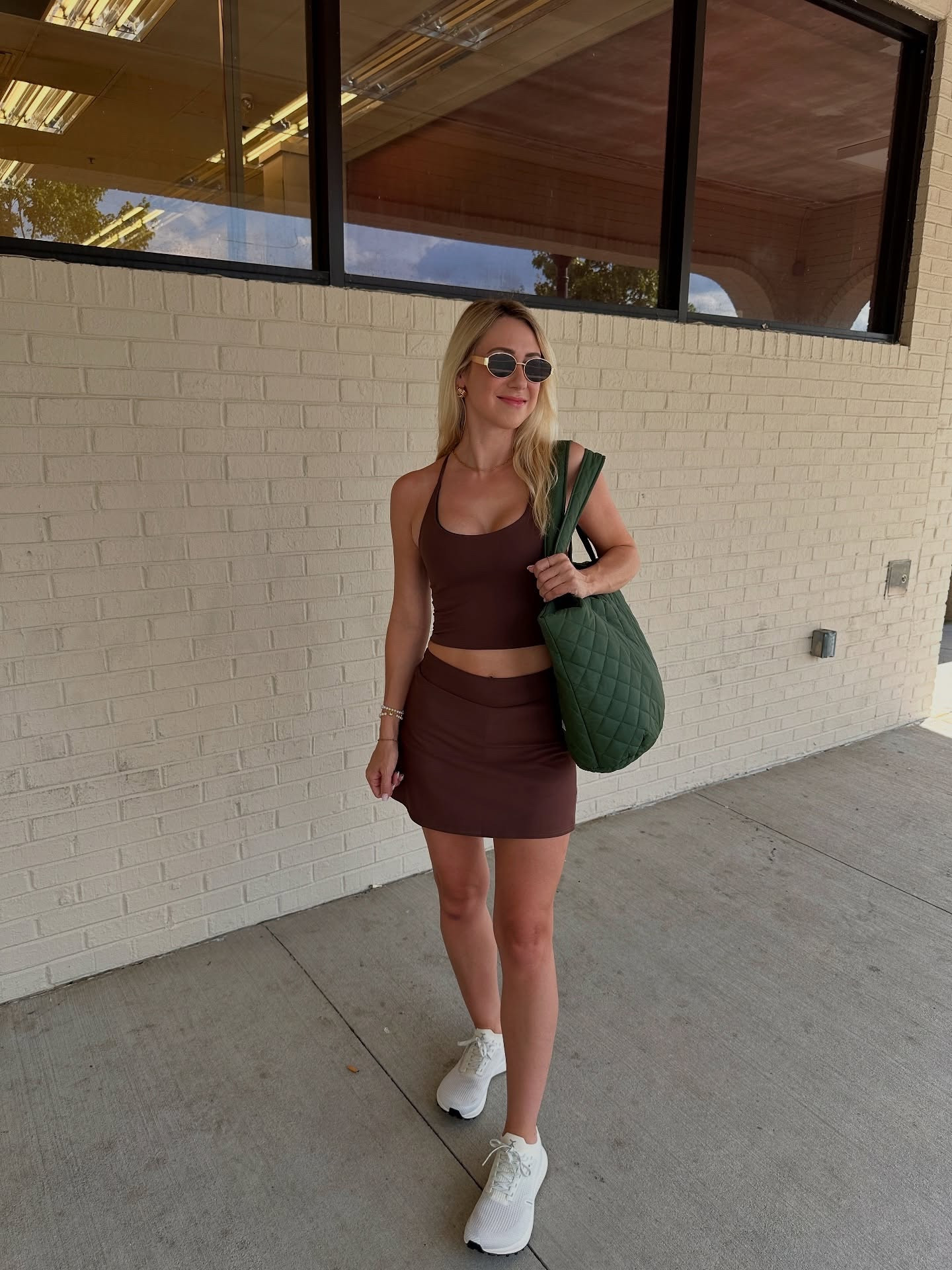 Don’t be afraid to give up the good to go for the great! Happy Friday eve⚡️ I bring this puffer bag from @greatlyandco to the gym and sauna often. I also carry it all of the time on weekend trips to bring my laptop and camera equipment. It comes in magenta, brown and yellow too 🌞

I also love this set by them. I just recently hiked the McDowell nature preserve in it. This New York based brand is always coming out with fresh new products and colors since they design, cut, and sew all our garments under one roof! 🪡 🧵 I have my eye on a few of the butter yellow pieces and the whole evergreen collection. 

The skort is only available in a pretty teal color called mascaw but it is marked down to just $30🦜 They are having a summer sale on other select styles so check it out! This company has a commitment to transparency and integrity in the fashion industry which I love. 

Shop my go-to bag in my bio! I also linked the set, sneakers, and shades. Have a great day! 🤗  #greatlyandco #ltkfashion #ltkactive #ltkunder100 #cltblogger #charlottenc