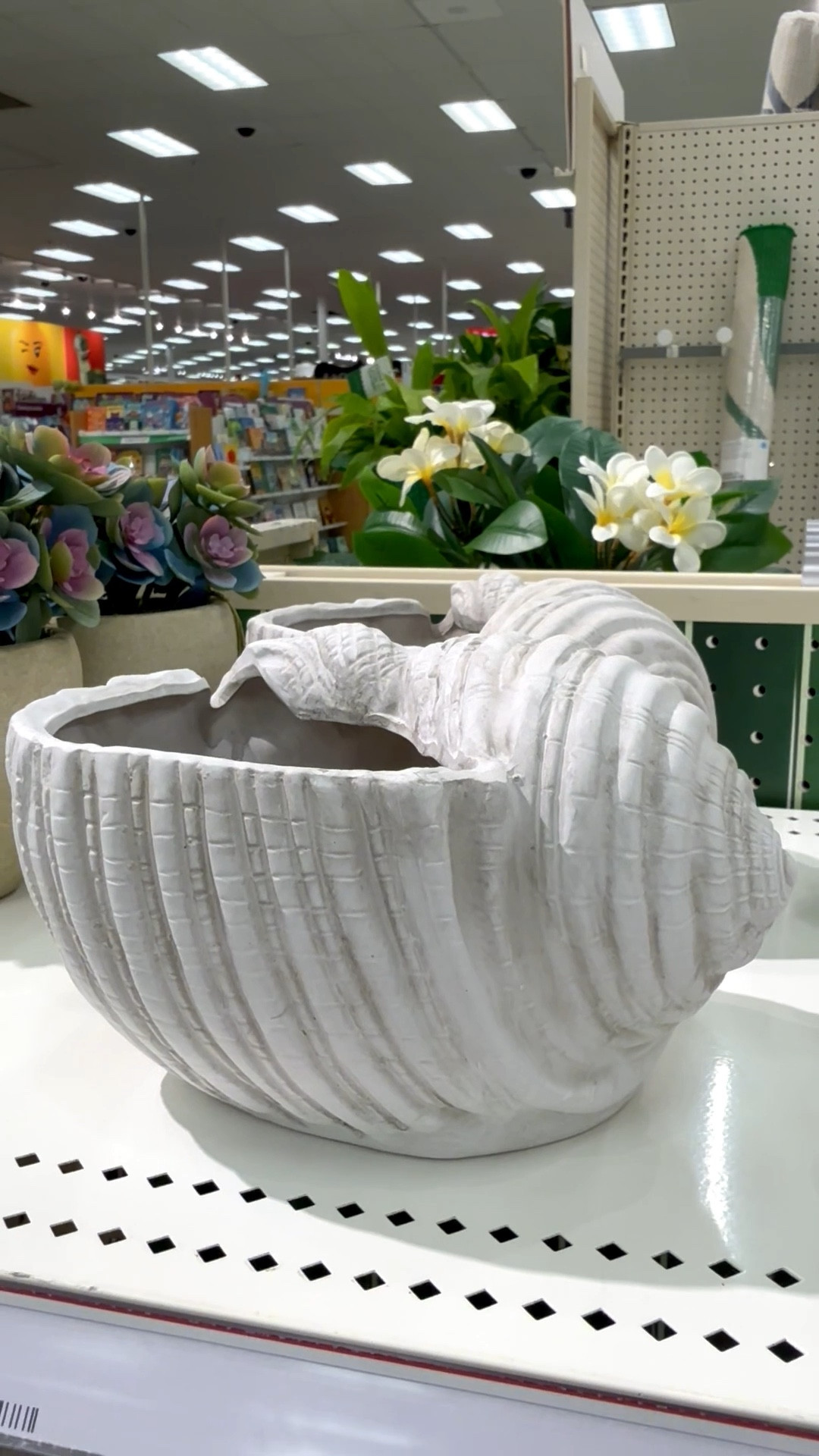 This ceramic shell planter is getting me so excited about the warmer weather months which means…outdoor entertaining, container gardening, and whimsical patio decor. 🐚

This adorable shell planter is perfect for faux or live plants (which don’t require much water). Tip: you can drill drainage holes in the bottom with a diamond drill bit. But this shell would also be cute for wrapped candy (I’m looking at you Starburst!✨), utensils, and bug repellant packets. Planter comes in two sizes.

If you’re a mosaic artist, this would also be a fun substrate for your tile work…whether you mosaic the inside, outside, or both! For mosaic tips, tutorials + inspiration please visit my YouTube channel: YouTube.com/julieweilbacher, and follow @julieweilbacher on Instagram.

#shellplanter #plantpot #beachhousedecor #cottagecore #cottagedecor #beachdecor #target #mosaic #ceramicshellplanter #patiodecor

#LTKSeasonal #LTKHome