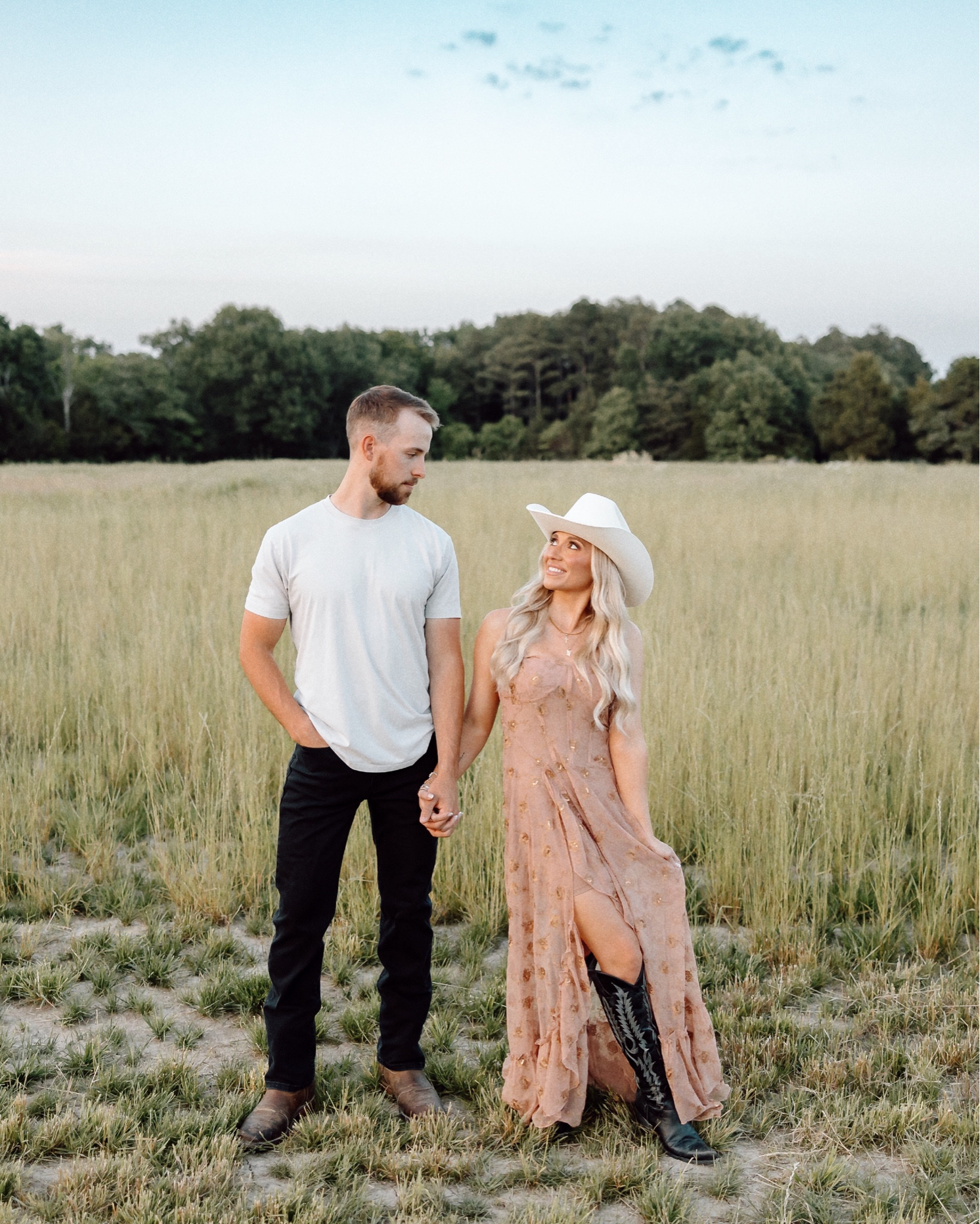 his and her outfit ideas for a engagement photoshoot | family photos | bride to bel photos | couples photos | lace white dress I ivory lace dress | free people bohemian styled | maxi dress for a festival 

western styled fits, boho style, bohemian styled dress, cowboy boots, cuts clothing, men's outfit ideas, couples photos

Romantic Golden Hour Engagement
Photoshoot
Missouri based couple and wedding photographer captures stunning and romantic engagement photos during golden hour showing dreamy posing ideas for couples and timeless outfit inspiration 
#romanticcoupleposes #engagementoufitideas

Comment SHOP below to receive a DM with the link to shop this post on my LTK ⬇ https://liketk.it/51tKi #ltkstyletip #ltkfamily #ltkwedding

#LTKPetite #LTKMens #LTKFamily