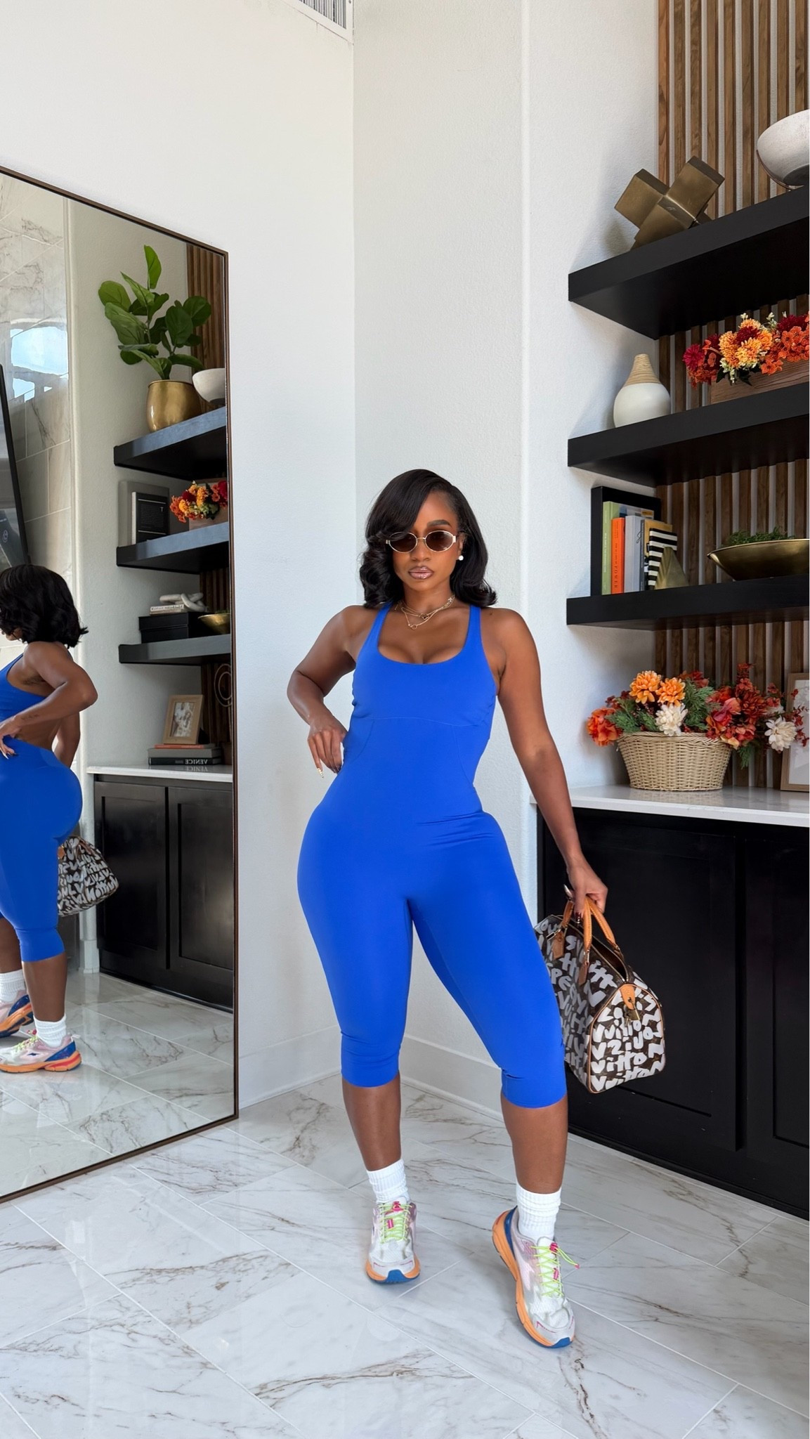 Styled my active jumpsuit from @Walmart with some of my fav accessories! Look good while running errands!

#LTKootd #LTKMidsize #LTKActive