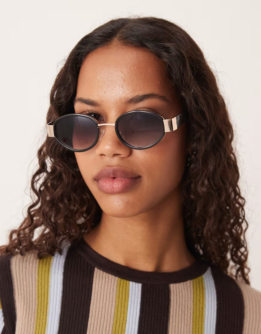 ASOS DESIGN metal frame oval sunglasses in black | ASOS (Global)