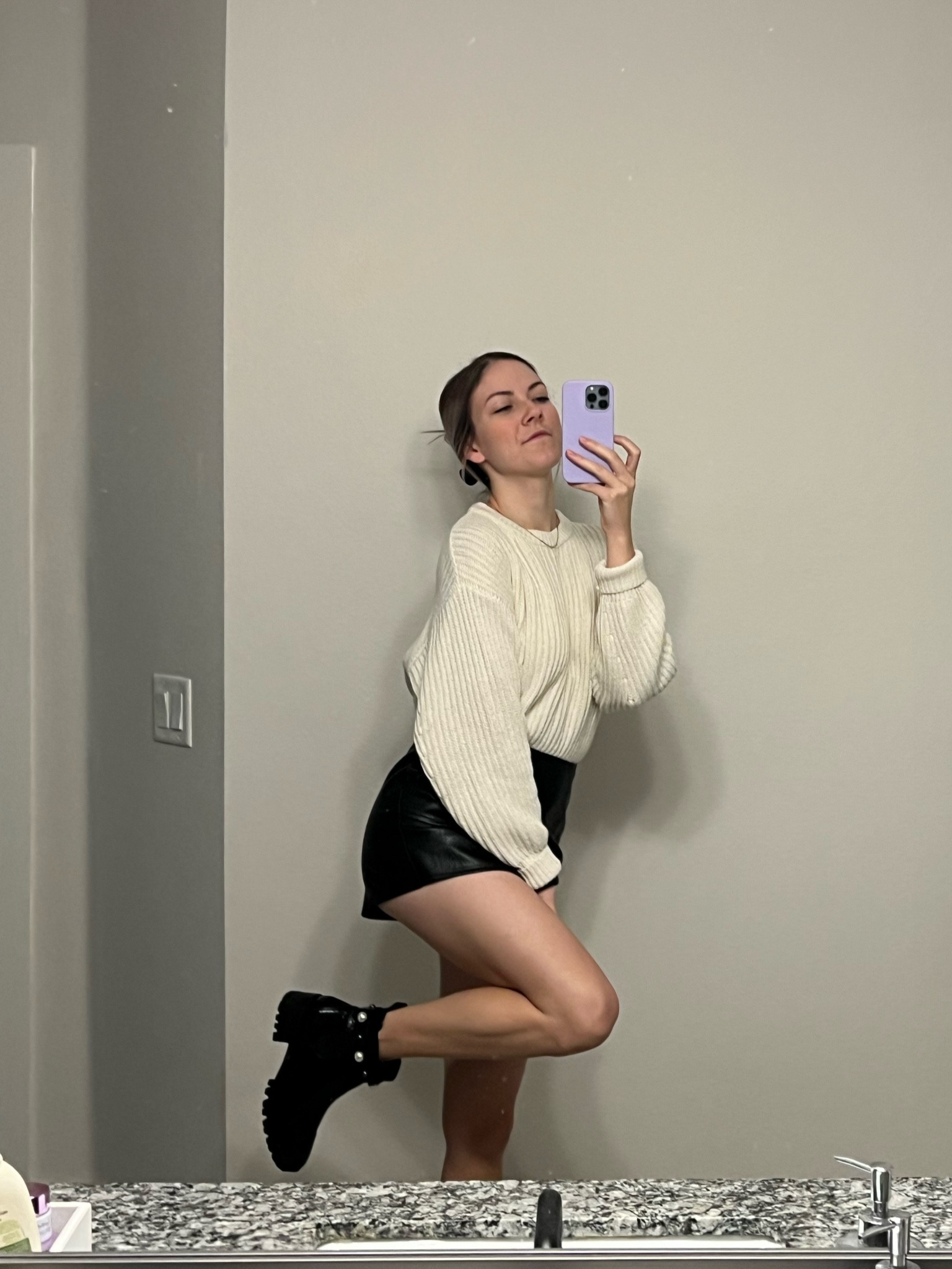 The weather in Florida has been perfect! Loving being able to wear sweaters, and I paired this with my black leather skort and favorite Karl Lagerfeld black booties   

#LTKunder100 #LTKsalealert #LTKSeasonal