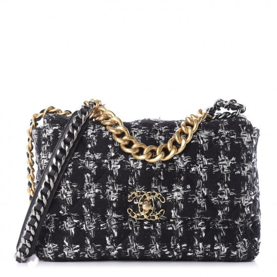 CHANEL

Tweed Quilted Large 19 Flap Black Ecru White


63 | Fashionphile