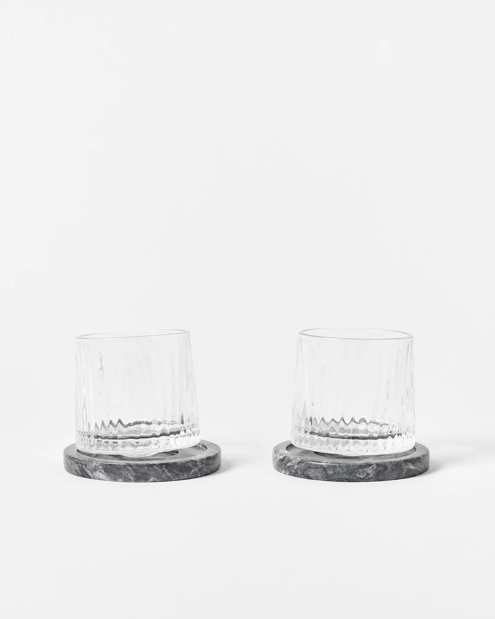 Medlock Spinning Whisky Tumblers & Coasters Set of Two | Oliver Bonas | Oliver Bonas (Global)
