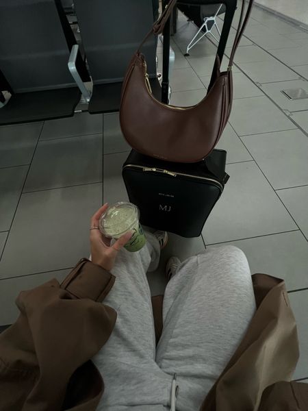 My airport POV🤎✈️ brown shoulder bag, hand luggage, cabin bag, suitcase, personalised

#LTKitbag #LTKtravel #LTKSeasonal