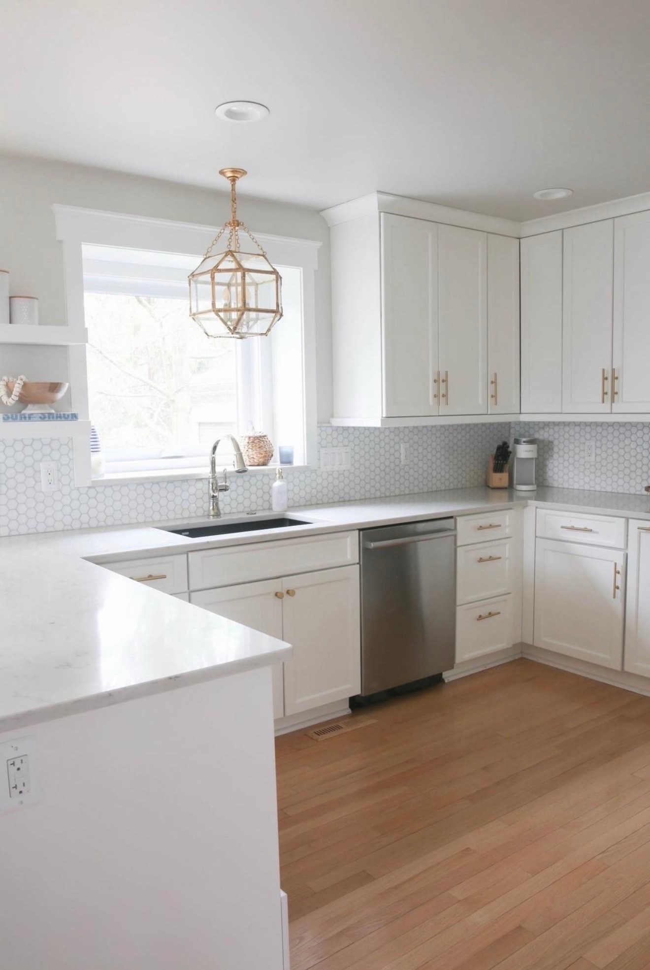This white coastal kitchen is light, bright and airy! The brass pendant light adds the perfect touch to the whole space!

#LTKHome #LTKSaleAlert #LTKU