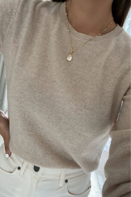 SOPHIYA Mia + Maya pendant (currently available in malachite + black) 
Cashmere sweater 
White jeans 

#LTKStyleTip #LTKFindsUnder50