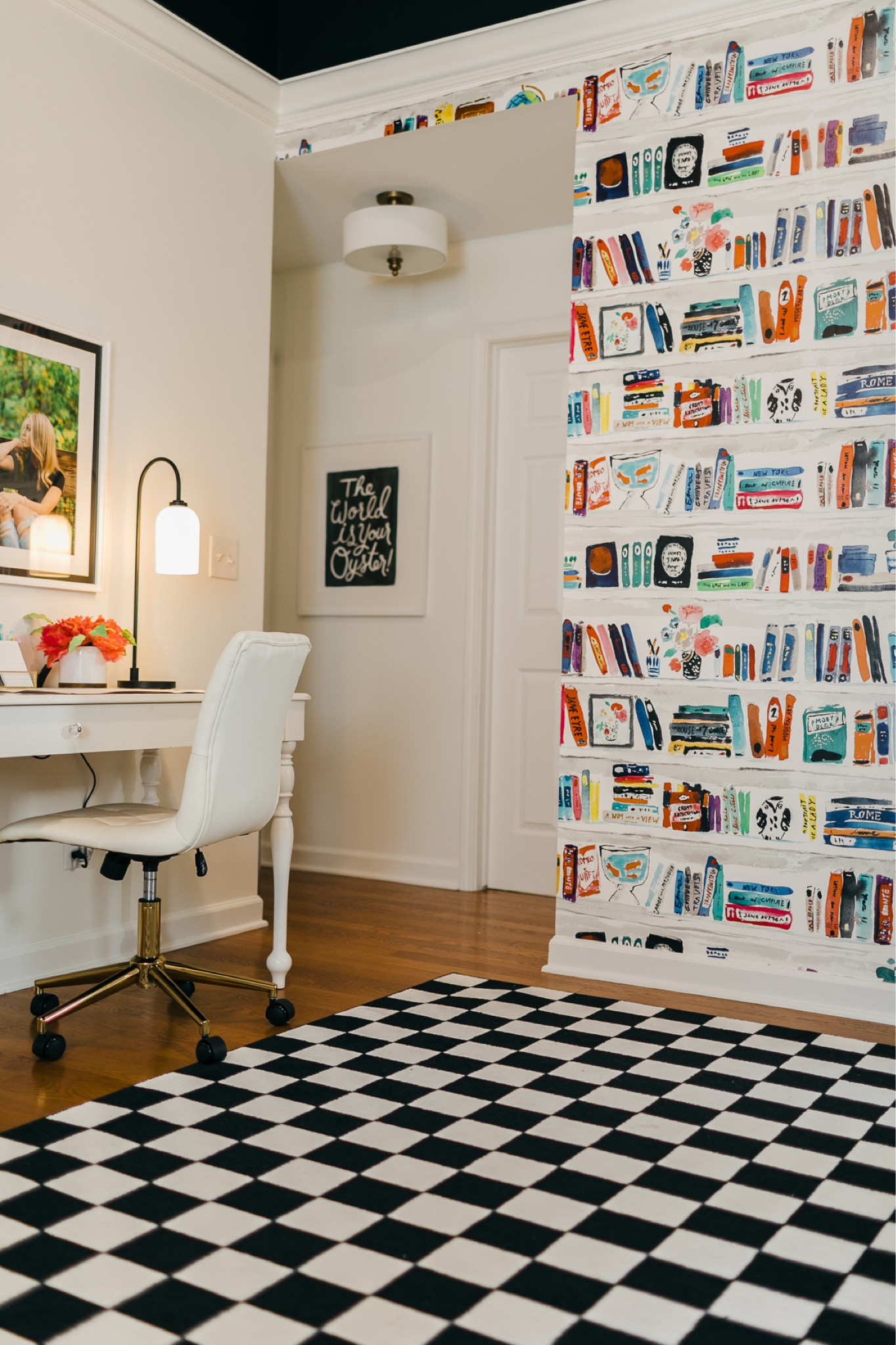 I turned the space at the top of my stairs into a mini workspace where 
my family can do homework or work on projects. It’s such a FUN corner of my home. I will forever crush on how this Kate Spade wallpaper and this black and white checkerboard rug compliment each other! Oh how I love the textures! 

#LTKhome