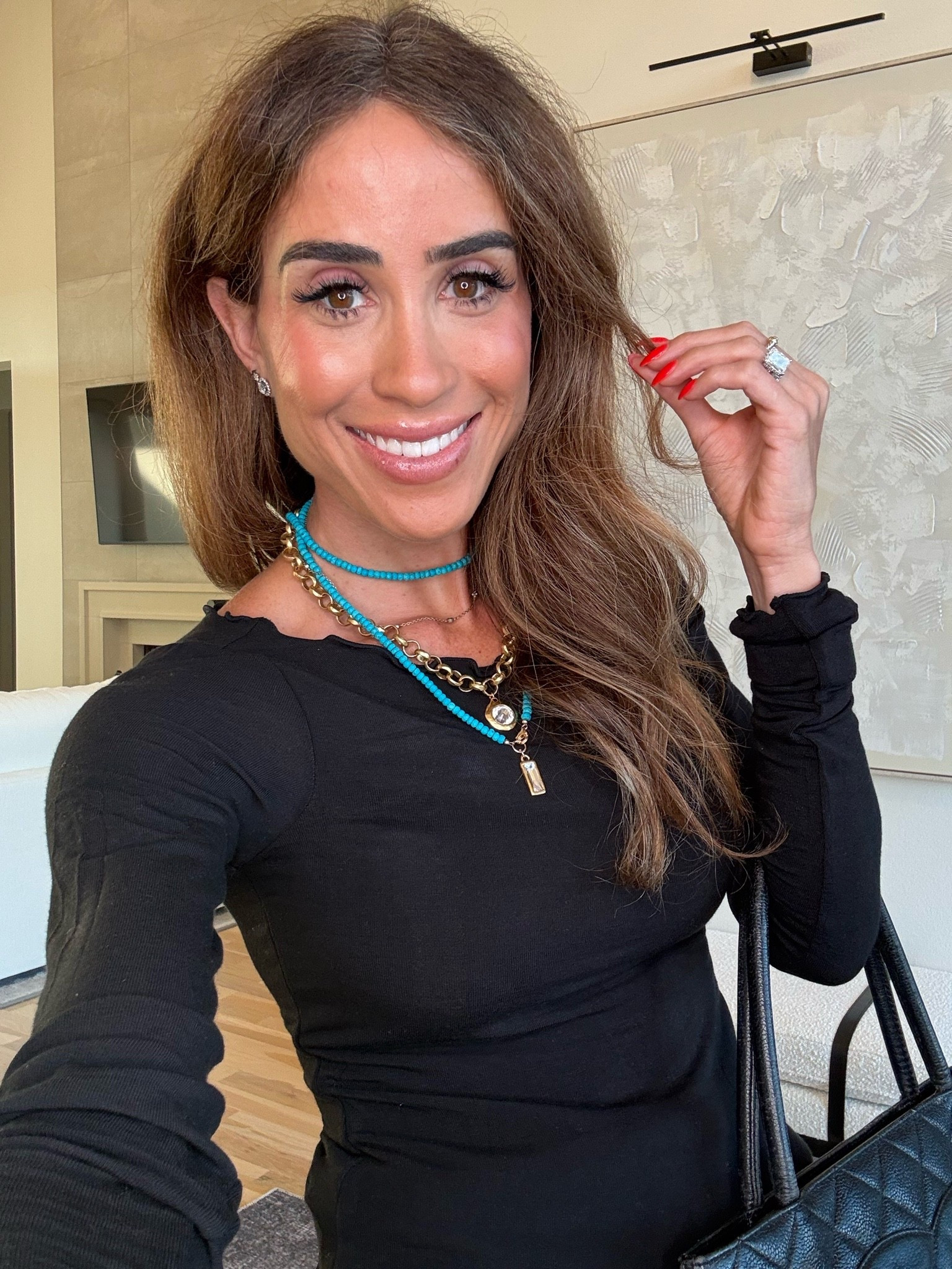 Fun black lettuce edged top with layered Tourquoise necklace