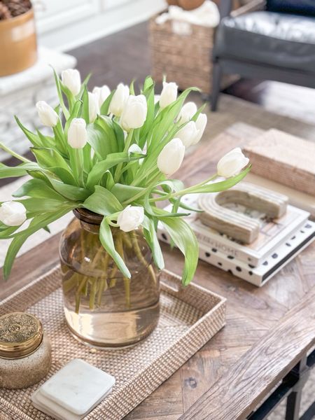 This amber vase is the perfect vessel for tulips or any other spring flowers and adds just the right touch to our neutral living room. home decor living room decor coffee table styling woven tray alabaster paint

#LTKhome #LTKSeasonal #LTKfindsunder50