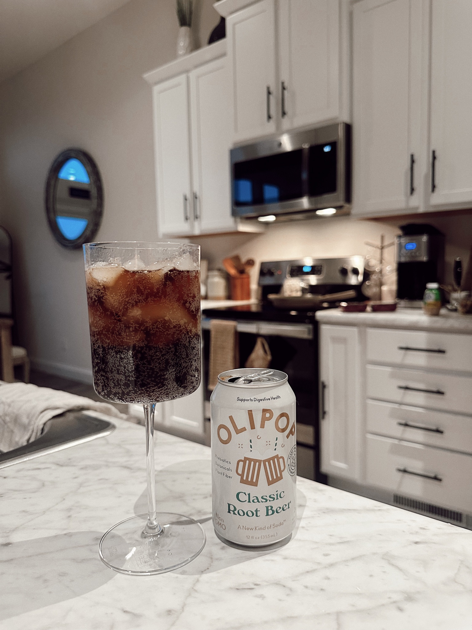 Oli pop in a wine glass 🤝 me 
my drink intake is usually just water and coffee, + homemade kombucha — but every now and again I love a good oli pop 🤌🏻

#LTKHoliday #LTKHome #LTKParties