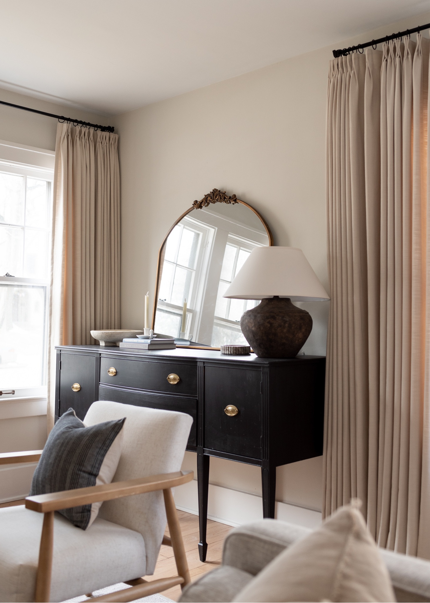 Cozy, transitional living room with custom curtains, vintage sideboard, and neutral home decor 

#LTKhome