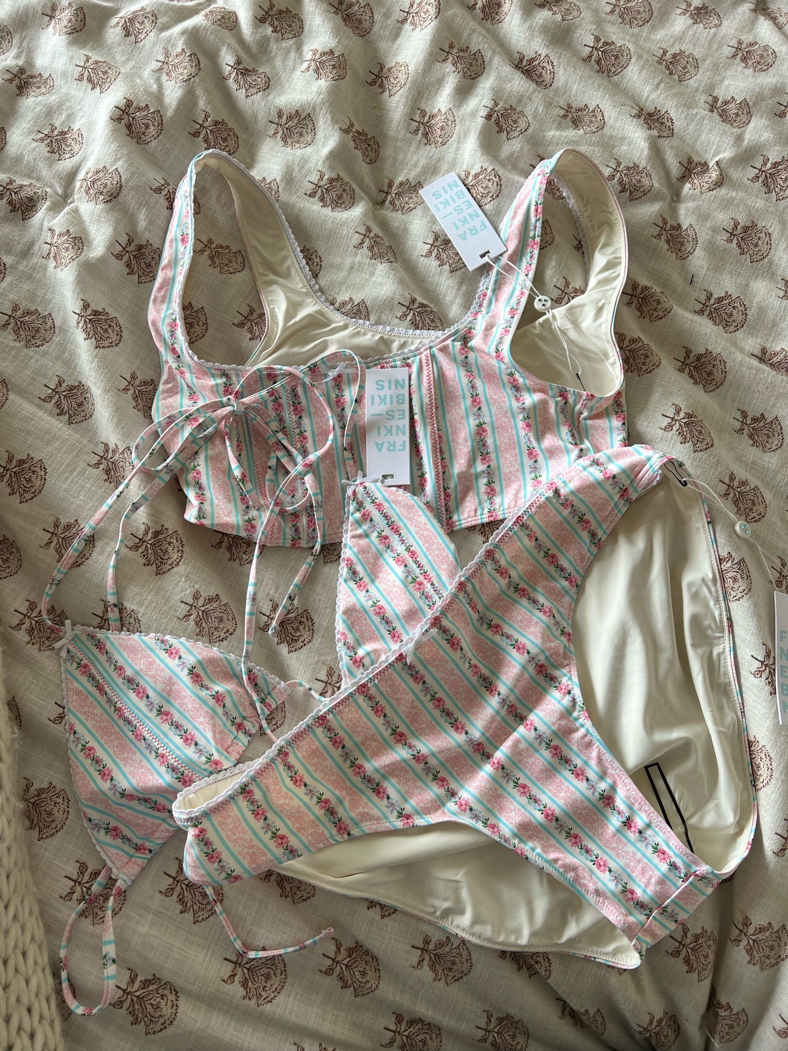 The way that this bikini is the pattern of my DREAMS. I got both tops in size large (string bikini was ok but needed XL in the bralette). Bottoms are size XL but a lil low waisted for me. 
Frankie’s bikinis
Spring swim

#LTKswim #LTKunder100 #LTKSeasonal