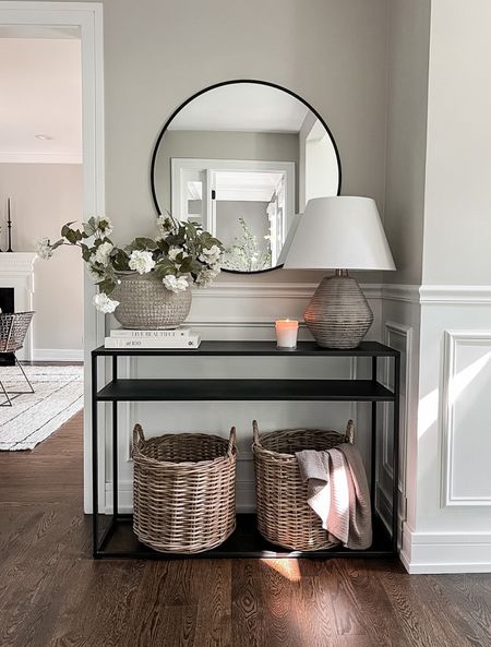 Our entryway foyer isn’t overly big, so this black metal console table works perfectly! I love this ceramic vase and florals styled here along with a mirror and table lamp! 

#LTKFind #LTKhome #LTKstyletip