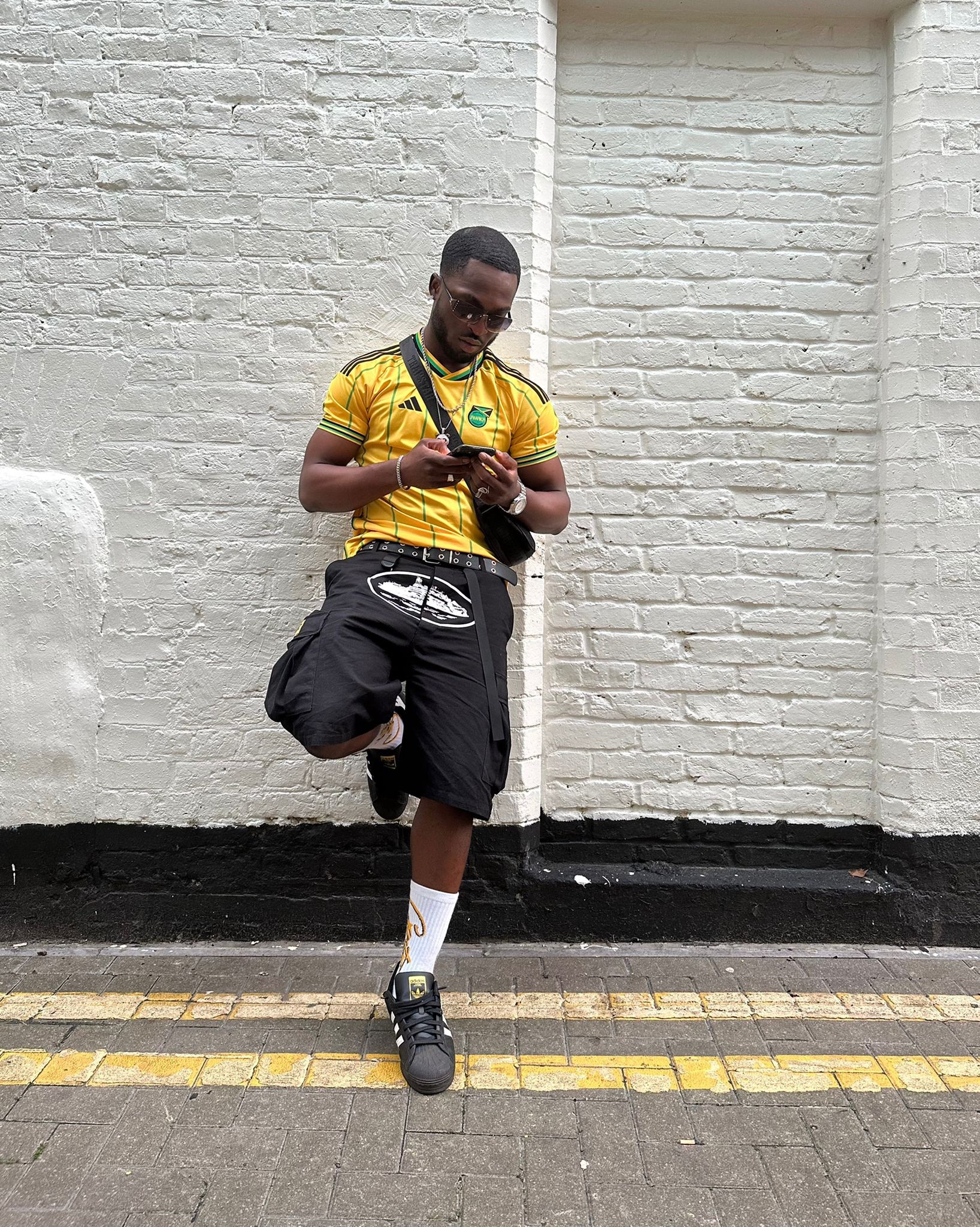 Adidas football shirt, black cargo pants, black superstars, men’s side bag, Cortez, carhartt 

#LTKstyletip #LTKSeasonal #LTKeurope